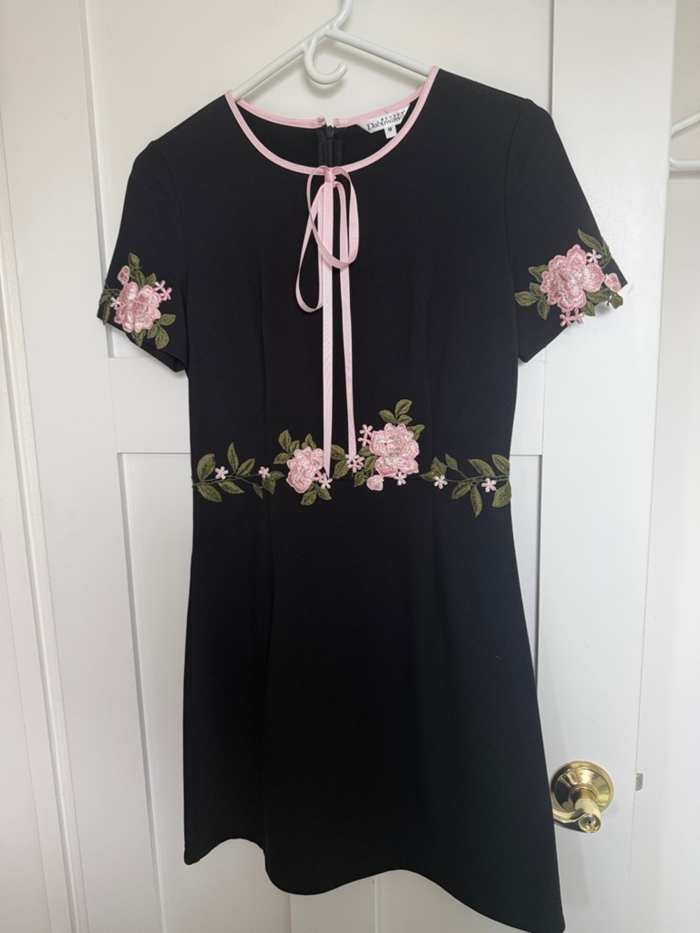 Black Mini Dress with Pink Floral Embroidery and Tie Neck